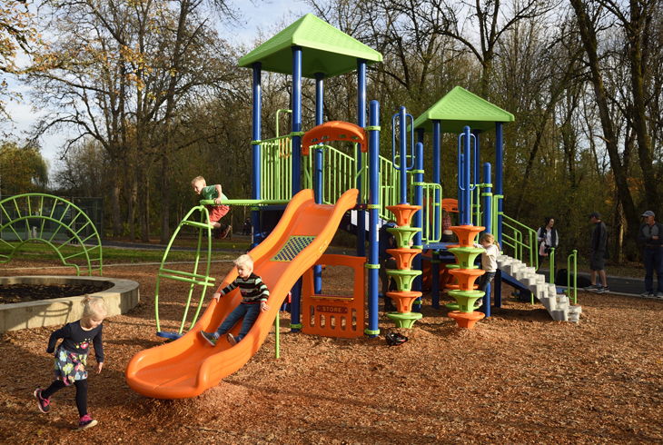 A colorful new play structure is among the new amenities at McMillan Park in Raleigh Hills.