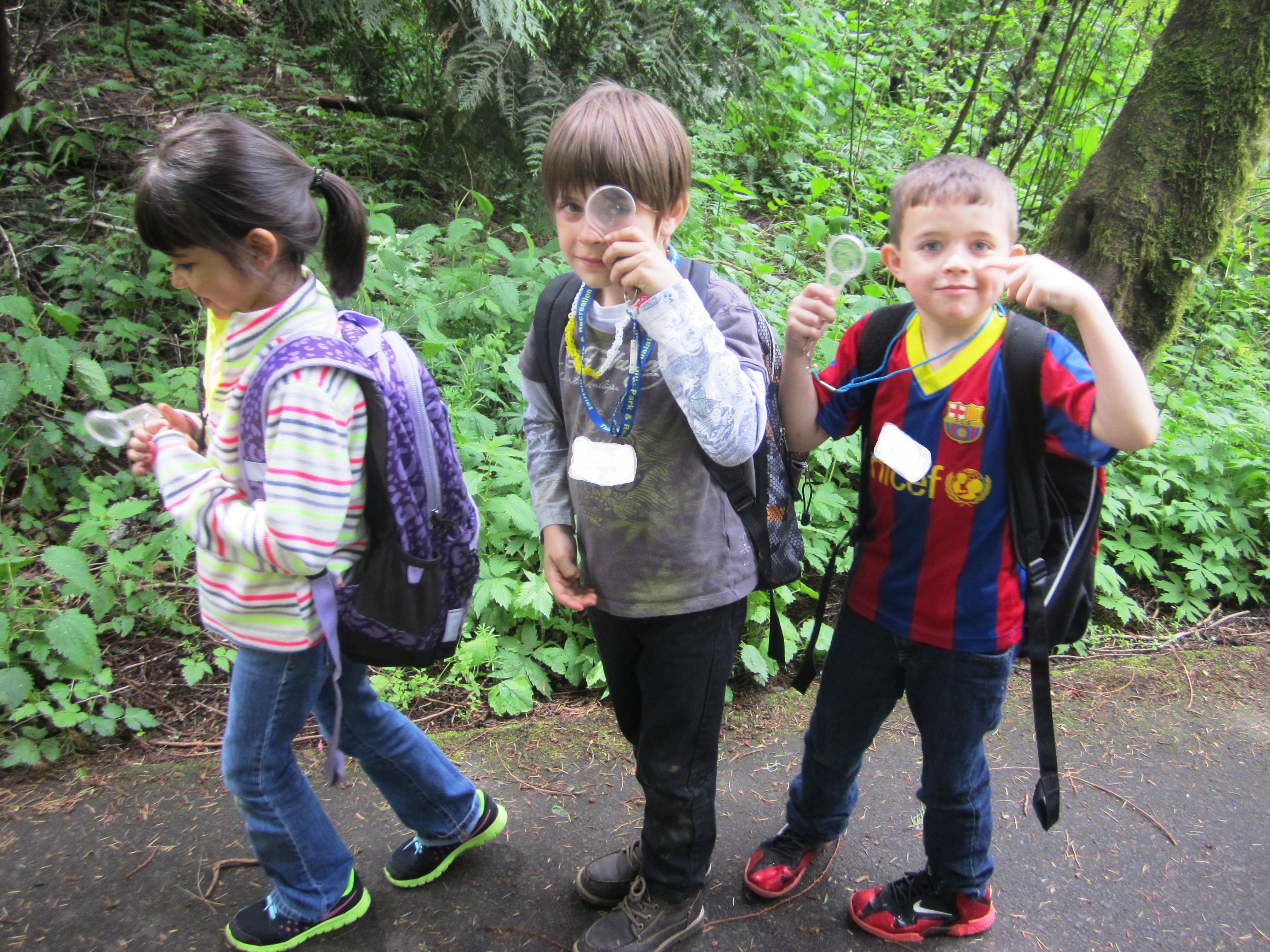 Elementary students use scientific tools to help study the natural environment of Tualatin Hills Nature Park.